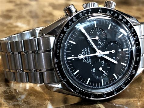 omega speedmaster manual review.